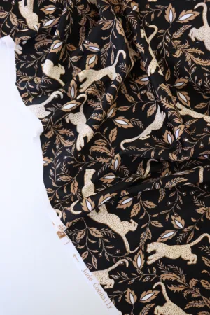 Leaping Leopards on Black Nylon Spandex Tricot | Designer Deadstock